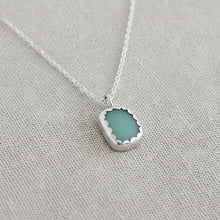 Necklace with a jadeite beach glass pendant
