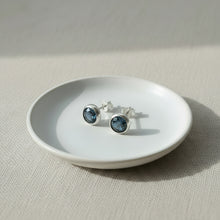 Pair of silver earrings with teal kyanite stones 
