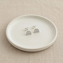 Silver earrings with rainbow design
